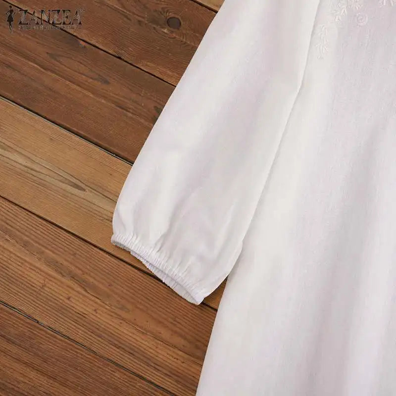 Toscana Embroidered Ruffle-Neck Blouse